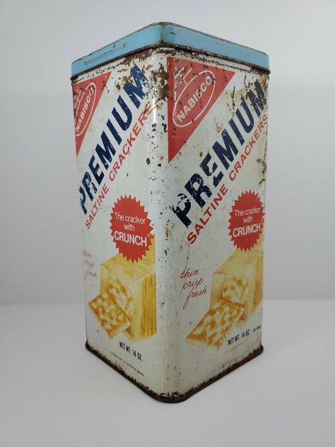 Vintage 1960's Nabisco Premium Saltine Crackers 14 oz Tin Metal Canister Box USA | Beautifully Distressed Storage Collectible Vintage 1960's Nabisco Premium Saltine Crackers 14 oz Tin Metal Canister Box USA.  Beautifully worn with age.  Perfect set piece! Measurements in inches: Height:   9.25 Width:  4.5 Length:  4.25 Vintage 1960's Nabisco Premium Saltine Crackers 14 oz Tin Metal Canister Box USA | Beautifully Distressed Storage Collectible Antiques Value, Antique Hand Tools, Metal Canisters, Tin Canisters, Saltine Crackers, Coffee Tin, Single Tree, Garage Sale Pricing, Metal Tins