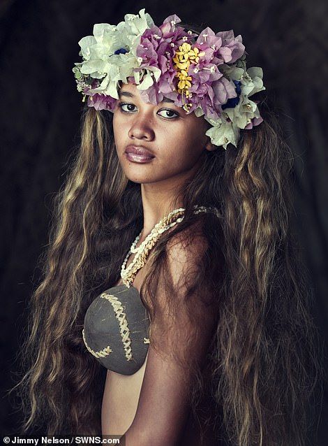 A woman from the Marquesas Island tribe of Northern French Polynesia. The constantly warri... Tribes In India, Jimmy Nelson, Marquesas Islands, Flowers In Her Hair, Indigenous Tribes, Indigenous Culture, We Are The World, French Polynesia, Island Girl