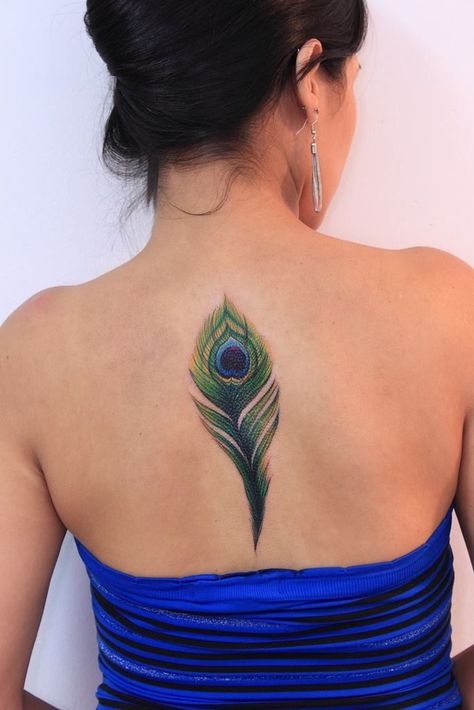 Tattoo Plume, Feather Tattoo Colour, Watercolor Tattoo Ideas, Delicate Tattoos For Women, Believe Tattoos, Stomach Tattoos Women, Tattoo 2024, Peacock Feather Tattoo, Wrap Tattoo