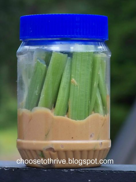 Celery sticks in an almost-empty peanut butter jar. | 19 Delicious Homemade Hiking Snacks Dipping Snacks, Snacks Road Trip, Roadtrip Snacks, Car Snacks, Trip Snacks, Diy Snacks, Road Trip Snacks, Carrot Sticks, Travel Snacks