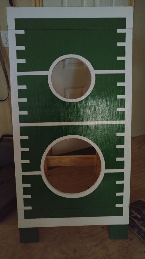 Football Toss made for 4H fundraiser booth. Football Fall Festival Game, Fall Festival Game Booth Ideas, Football Toss Carnival Game, Trunk Or Treat Football Theme, Fall Festival Game Signs, Fall Festival Bowling Game, Harvest Festival Games Booth Ideas, 4h Games, Harvest Festival Games