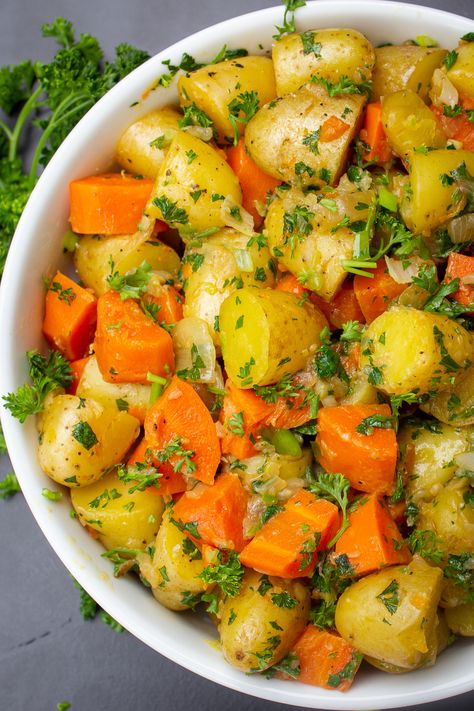 Buttery, herby, garlicky, oniony potatoes and carrots. The instant pot does a great job with this easy comfort food side dish. Not fancy. Just delish. Cabbage Carrots And Potatoes Instant Pot, Instant Pot Potatoes And Carrots Only, Crock Pot Potatoes And Carrots, Potato And Carrot Recipes Slow Cooker, Instant Pot Potatoes And Carrots, Potatoes And Carrots In Instant Pot, Carrot And Potato Recipes, Instapot Veggies, Instant Pot Potato Recipes