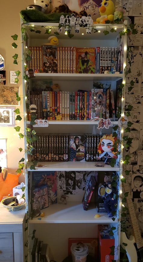 #roominspo #animeroom #aestheticroom #clutercore #maximalism #mangashelf #manga #jjba #jojo #demonslayer #kny #nintendoswitch #electricguitar #y2kroom #komicantcommunicate #nana #spyfamily #aot #tbhk #aestheticshelf Anime Maximalism, Jjba Room Decor, Anime Shelf Aesthetic, Anime Shelves Aesthetic, Manga Shelf Aesthetic, Anime Collection Room Aesthetic, Manga Shelves, Manga Collection Shelf Aesthetic, Y2k Room