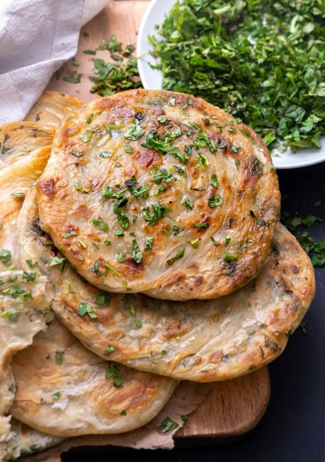 Herbed Olive Oil Parathas (Flaky Indian Flatbread) Infused Olive Oil Recipes, Wandering Chickpea, Paratha Bread, Olive Oil Pizza, Herb Infused Olive Oil, Indian Flatbread, Olive Oil Recipes, Indian Foods, Vegetarian Indian