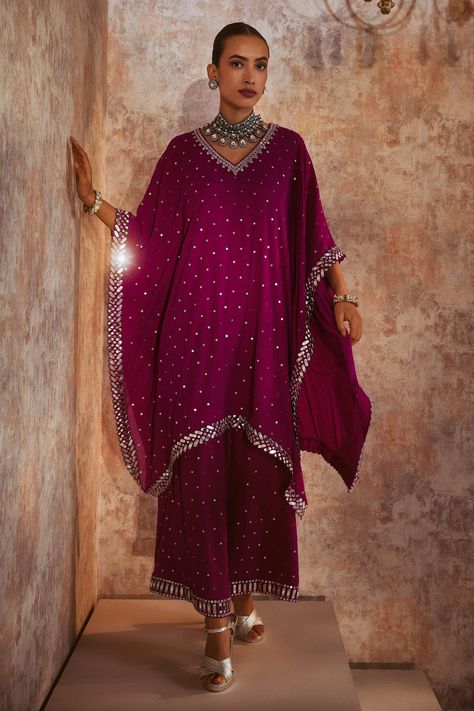 Shop for Vvani by Vani Vats Wine Georgette V Neck Embroidered Kaftan And Palazzo Set for Women Online at Aza Fashions Traditional Purple Kaftan For Festive Occasions, Wedding Kaftan With Gota Work For Festivals, Purple Semi-stitched Palazzo Set With Mirror Work, Purple Mirror Work Palazzo Set For Eid, Semi-stitched Purple Palazzo Set With Mirror Work, Bollywood Style Purple Palazzo Set With Mirror Work, Purple Palazzo Set With Mirror Work For Festive Occasions, Eid Chanderi Kaftan With Mirror Work, Bollywood Style Wedding Kaftan With Gota Work