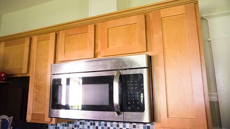 Many times an over-the-range microwave that recirculates cooking fumes can be converted to exhaust to the outside. Here's how to go about it. Over Range Microwave, Otr Microwave, Stove Vent, Kitchen Vent, Kitchen Exhaust, Hood Vent, Build A Frame, Exhaust Vent, Microwave In Kitchen