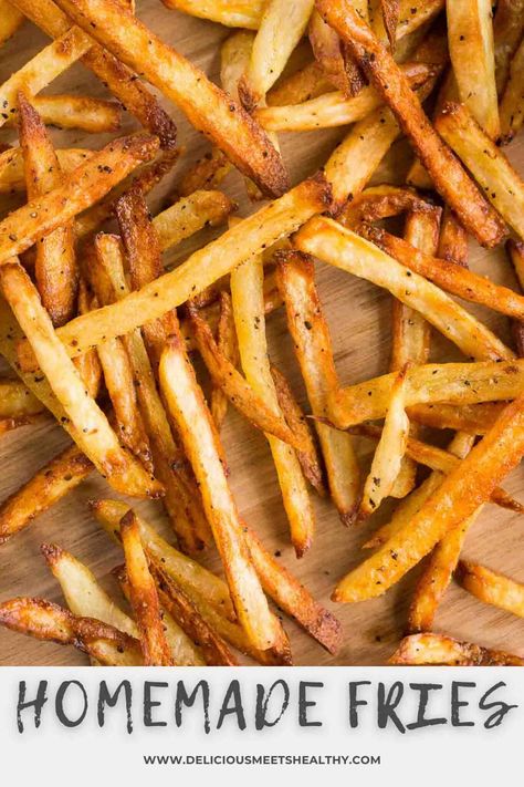 Whether you are serving them as an appetizer or side dish, these homemade French fries are hands down delicious. Oven baked, this recipe is so simple and easy to make, and the fries come out perfectly crispy and fluffy in the middle. Homemade Fries In Oven, Freeze French Fries, French Fries In The Oven, Oven French Fries, Oven Baked French Fries, Frozen Fries, Potatoes Fries, French Fries At Home, Food Fries