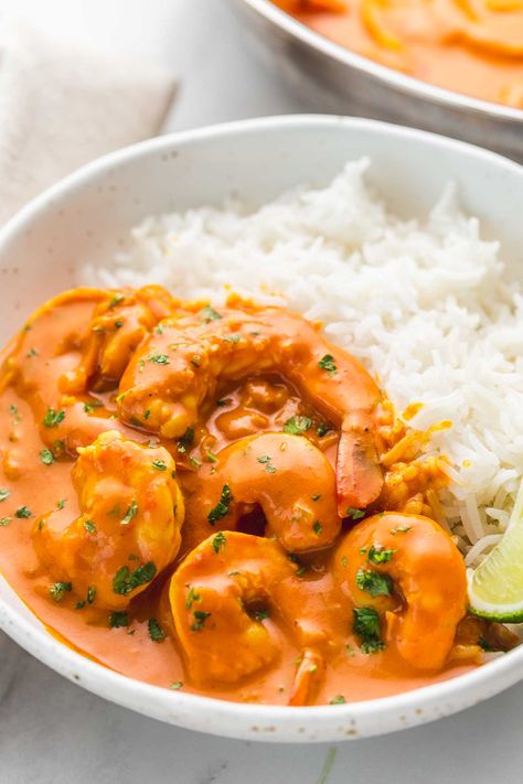 This one-pan coconut shrimp curry is made with a creamy and aromatic coconut curry sauce made from scratch. This delicious dinner is so easy and ready in no time! Serve over steamy rice, homemade naan bread, and wedges of fresh lime. Homemade Coconut Curry, Shrimp And Potato Curry, Seafood Coconut Curry, Curried Prawns And Rice, Easy Coconut Curry Shrimp, Shrimp Coconut Curry Recipe, Coconut Shrimp With Rice, Spicy Shrimp Curry, Creamy Prawn Curry