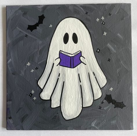 "6\"x6\" Hand Painted Halloween Ghost with with Book Canvas Painting This small ghost painting is the perfect addition to your fall/Halloween decor.  Hand painted on a 6\"x6\" canvas with acrylic paint, each painting is one of a kind. These paintings are made to order and may vary slightly.  A great gift for a friend or family member or perfect just for you! **This is a FLAT canvas. It is as thick as a piece of cardboard and does not have a wooden frame." Book Canvas Painting, Easy Ghost Painting, Ghost With Book, Ghost Halloween Decor, Halloween Canvas Paintings, Art Mini Toile, Halloween Canvas Art, Hand Painted Halloween, Ghost Painting