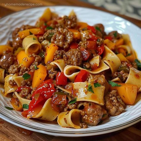 Italian Drunken Noodles: A Flavorful Pasta Dish Italian Pasta Dishes Red Sauce, Sausage Tomato Pasta Recipes, Italian Sausage And Peppers Skillet, Chef John’s Drunken Noodles, Italian Drunken Noodles Sausages, Italian Food Breakfast, Italian Peppers And Sausage, Sausage Sauce Recipes, Large Pasta Noodles