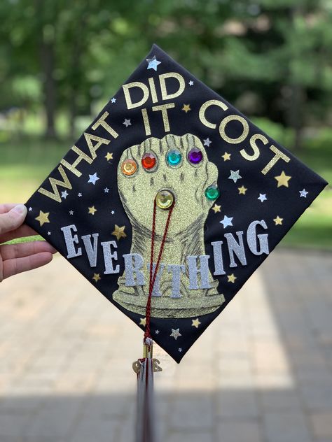 Avengers graduation cap thanos infinity gauntlet Thanos Graduation Cap, Avengers Graduation Cap, Marvel Graduation Cap, Marvel Graduation Cap Ideas, Graduation Cap Designs For Guys, High School Graduation Cap Designs, Graduation Hat Designs, Graduation Things, College Grad Cap Ideas