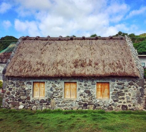 The island of Batanes is hit by typhoons about 8 times a year on average. The Ivatan houses are made of compact limestone walls and thick cogon roofs to withstand the strong winds and heavy rains. #batanescapade Pyramid Roof, Elevated House, Bamboo Roof, Conceptual Model Architecture, Limestone Wall, Architecture Sketchbook, Vernacular Architecture, House Window, Hip Roof