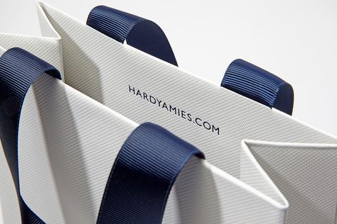 Progress Packaging Hardy Amies Luxury Fashion Carrier Bags Handles Ribbon Bespoke Packaging, Luxury Paper Bag, Paper Carrier Bags, Shopping Bag Design, Paper Bag Design, Luxury Packaging Design, Packaging Ideas Business, Retail Bags, Clothing Packaging