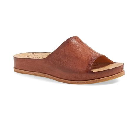 PRICES MAY VARY. PREMIUM LEATHER OPTIONS: Elevate your style with the Kork-Ease Tutsi Slip-On Sandal, offered in a variety of premium leather options. Select from soft hand-finished leather for a smooth, silky feel, metallic leather for a stylish shine, or suede leather for a classic look. BREATHABLE SUEDE LINING: Keep your feet comfortable and cool all day long with the breathable soft fabric suede lining. The soft and plush lining not only feels good against your skin, but also helps regulate Shoe Boot Sandals, Sandal Women, Leather Slip Ons, Slide Sandals, Slip On Sandal, Women's Shoes Sandals, Heeled Mules, Suede Leather, Slip On Sneaker