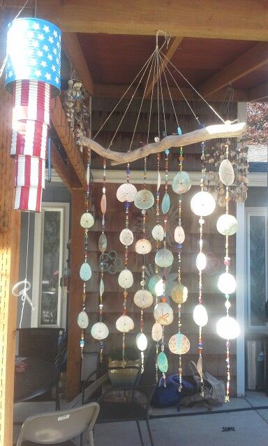 Sand Dollar Ideas Diy, Ideas For Sand Dollars, Sanddollar Crafts Home Decor, Craft With Sand Dollars, Sand Dollar Wind Chime, Sand Dollar Craft Wall Decor, Things To Do With Sand Dollars, Sand Dollar Diy, Diy Sand Dollar Crafts