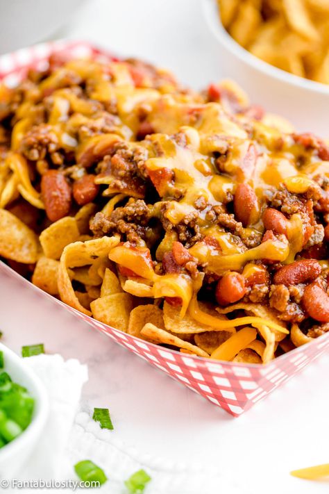 This Frito Chili Pie is so easy! #frito #chili #fritopie #fritochilipie #fritos #walkingtacos Frito Bag Chili, Easy Frito Taco Pie, Chili Pie Frito, Fritos Scoops Recipes, The Best Frito Pie, Upside Down Frito Pie, Dinners With Chili, Chili Fritos Recipe, Frito Pie Bar Parties