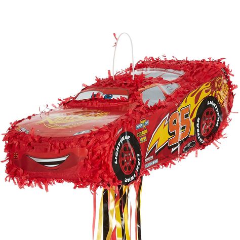 PRICES MAY VARY. Get the Party Started with Lightning McQueen: Party City's Pull String Red Lightning McQueen pinata from Cars 3 is the perfect way to complete the decorations for your Cars-themed party. Guests will love this pinata shaped like a race car covered in decals to resemble the famous character. Covered in red fringe with red, yellow, and black ribbons cascading at the bottom. Strong plastic loop attached for convenient hanging. Filler sold separately. Ditch the Blindfold: This pinata Pinata Mexicana, Car Pinata, Lightning Mcqueen Car, Mcqueen Car, Pixar Cars Birthday, Flash Mcqueen, Cars 3 Lightning Mcqueen, Disney Cars Party, Disney Cars Birthday