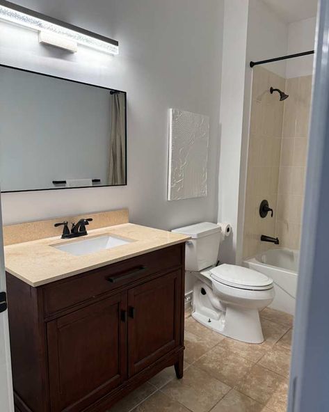 A Simple DIY Upgrade Completely Transforms This “Dated” Bathroom Old Beige Tile Bathroom Ideas, Update Beige Tile Bathroom, Updating Beige Tile Bathroom, Beige Tile Bathroom, Shiplap Feature Wall, Orange Tiles, New Toilet, Beige Tile, Gold Fixtures