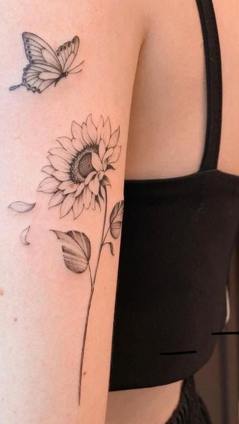 Sunflower With Petals Falling Tattoo, Tattoo Sunflower And Butterfly, Elegant Sunflower Tattoo, Sunflower Tattoo On Leg, Sunflower Tattoo Back Of Arm, Sunflower Line Tattoo, Sunflower Tattoo Sketch, Sunflower Back Tattoo, Butterfly And Sunflower Tattoo