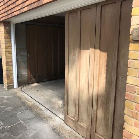 Look at this garage door! It has an opening that is pushed to the side, making it look simple and quite space saving. At the bottom it is equipped with a rail that will make it easier for everyone to operate this garage door. This time we are using a slide to the side garage door which is made using wood so that it will present an attractive rustic look and manage to steal the show. Slide to the Side Garage Doors from @hollingtondoors Folding Garage Door, Side Garage Door, Folding Garage Doors, Garage Door Lights, Side Hinged Garage Doors, Side Garage, Retractable Glass Doors, Sliding Garage Doors, Carriage Garage Doors