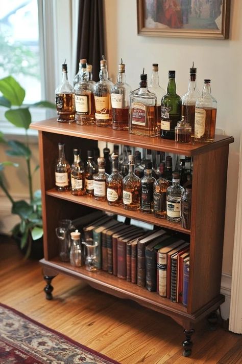 "Repurpose an old bookshelf into a custom Bar Cart! 🛠️🍹 Ideal for adding a chic, functional piece to your space. #UpcycledBookshelf #BarCartDIY #EntertainingInspiration" Liquor Bookshelf Ideas, Bookshelf As Bar Cart, Diy Drinks Cabinet, Bourbon Storage Ideas, Bookshelf Turned Into Bar, Bookshelf Bar Ideas, Vintage Bar Dresser, Whiskey Cabinet Ideas, Bourbon Display Ideas