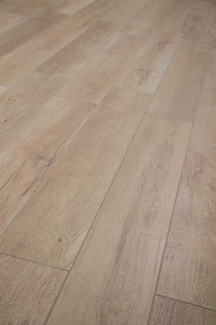 Wood Looking Ceramic Tile Floors, Ceramic Floors That Look Like Wood, Wood Tile Basement Floor, Basement Porcelain Tile Floor, Floor And Decor Wood Tile, Medium Brown Tile Wood Floor, Wood Plank Ceramic Tile Floor, Ceramic Tiles Wood Look, Ceramic Flooring That Looks Like Wood