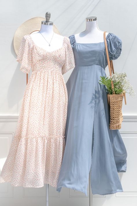 Inspired by romantic regency day dresses, the Authoress dress in a stormy twilight blue tencel-linen blend features an open, corset style back, square neckline, an empire waistline, and short puffed sleeves. Perfect for a picnic in the park, a day spent frolicking with friends, or just for lounging in with a cup of tea and your favorite Jane Austen novel! Please Note- This item is final sale only. . Details: S: Bust: 34"-36", Waist 28"-32", Length 52" M: Bust 36"-38", Waist 30"-34", Length 53" L Empire Waist Short Dress, Chirch Dresses, Blue Sun Dresses, Linen Cottagecore Dress, Pretty Modest Dresses, Simple Modest Dresses, Pride And Prejudice Outfits, Cute Dresses For School, Picnic Dress Ideas