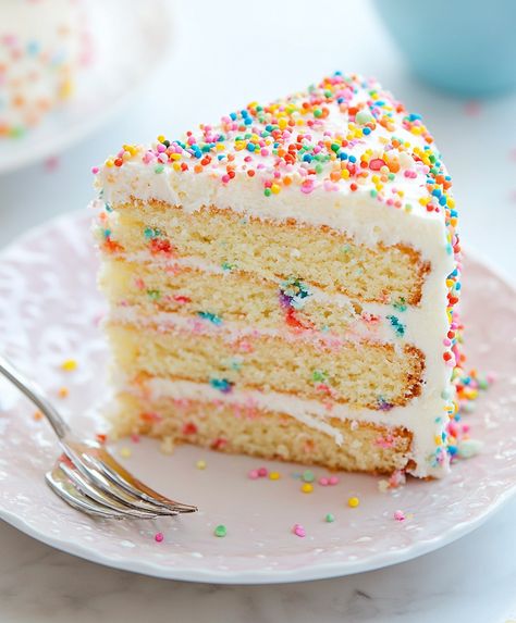 Bright and festive Confetti Layer Cake bursting with colorful sprinkles. Perfect for birthdays or celebrations. Easy to bake and delicious! Sprinkle Covered Cake Birthday, Confetti Cake With Chocolate Frosting, Vegan Confetti Cake, Funfetti Cake Aesthetic, Easy Confetti Cake, Confetti Cake Recipe, Funfetti Layer Cake, Birthday Cake With Sprinkles, Confetti Cake Recipes