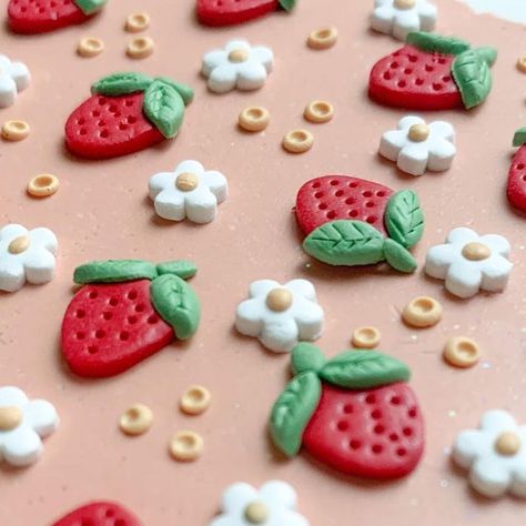 The Little Luna Shop on Instagram: "Made a little tiny slab for National strawberry day and it’s so adorable 🥰🍓 Strawberries will always remind me of my daughter. ❤️ . . . . . . . . . . #nationalstrawberryday #strawberry #strawberries🍓 #clay #polymerclayslab #flowers #spring #clayearrings #polymerclayartist" Polymer Clay Beginner, Polymer Clay Strawberries, Diy Clay Strawberry, Strawberry Clay Art, Clay Crafts Strawberry, Clay Art Strawberry, Clay Rings Strawberry, Polymer Clay Ideas For Beginners, Strawberry Polymer Clay Earrings