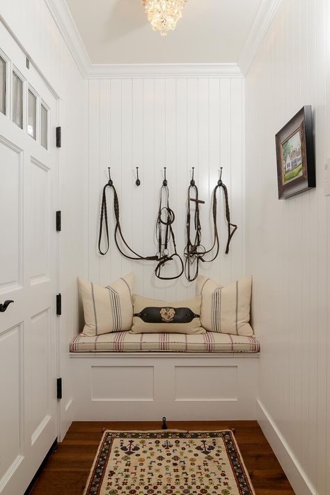 The home is full of character and thoroughbred details, including this paneled foyer nook with a built-in bench. The story of the equestrian family who resides here is all in the details. Equestrian Christmas, Farmhouse Foyer, Farmhouse Entry, Entry Decor, Hgtv Dream Home, Equestrian Decor, Tack Room, Horse Decor, Built In Bench