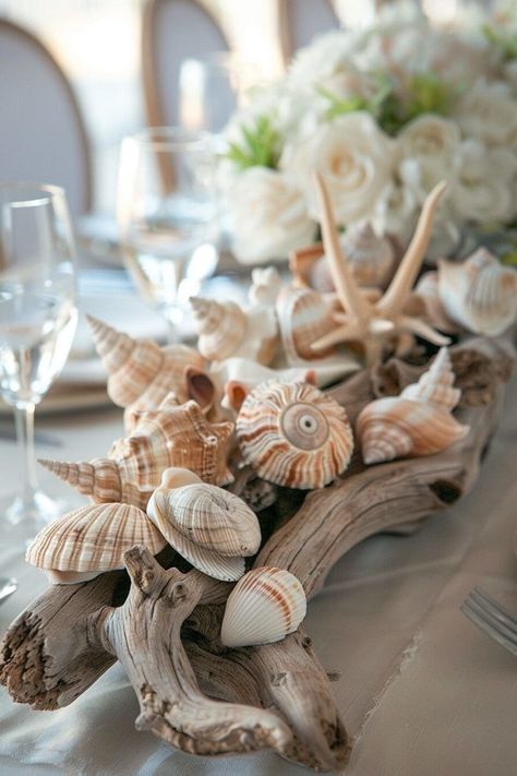 30 Unforgettable Wedding Table Centerpieces That Will Steal the Show Beach Wedding Diy Decorations, Beach Table Centerpieces, Seashell Table Decor, Beach Table Settings, Beach Theme Centerpieces, Seashell Table, Seashell Centerpieces, Beach Centerpieces, Driftwood Centerpiece