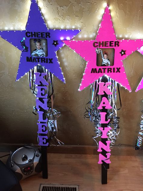 Cheer competition star sign with lights! Too ironic with my daughters name and nieces name (spelled different) but two original names regardless Signs For Cheer Competition, Cheerleading Competition Signs, Cheer Posters Ideas, Spirit Stick Ideas Diy, Cheer Posters Ideas Signs, Cheer Locker Decorations, Cheer Spirit Sticks, Cheerleading Crafts, Cheerleading Signs