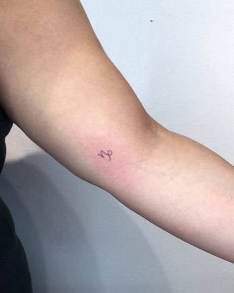 Capricorn Zodiac symbol tattoo on the inner arm. Zodiac Sign Tattoo Placement, Capricorn Tattoo Finger, Mini Capricorn Tattoo, Capricorn Ankle Tattoo, Minimal Capricorn Tattoo, Tiny Capricorn Tattoo, Capricorn Tattoo Symbol, Capricorn Tattoo Aesthetic, Tattoo Ideas Female Capricorn