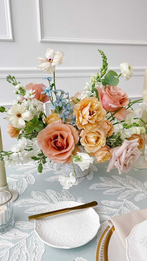 Colorful Summer Wedding Centerpieces, Wedding Flowers Pop Of Color, Floral Arrangement Centerpieces, Fruit And Flowers Wedding Decor, Pastel Orange Decor, Muted Color Wedding Flowers, June Wedding Floral Arrangements, Late June Wedding, Falling For Spring Wedding