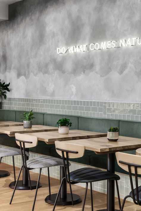 Farmer J restaurant in London boasts grey surfaces and green accents Butik Design, Café Design, Neon Signage, Restaurant In London, Decoration Restaurant, Design Café, Concrete Walls, Coffee Shops Interior, 카페 인테리어 디자인