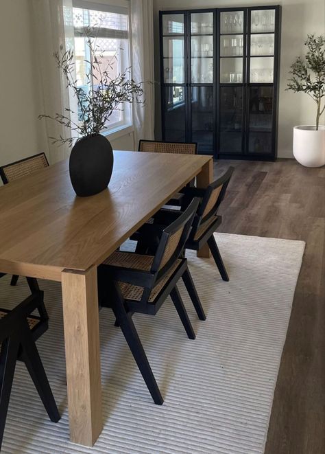 Large Modern Dining Room Table, Black Vase On Dining Table, Black Accent Dining Chair, Accent Chairs In Kitchen Breakfast Nooks, Modern Wooden Dining Table And Chairs, Black Dresser Dining Room, Aesthetic Dining Room Modern, Dining Mural Wall, Dining Table Chairs Black