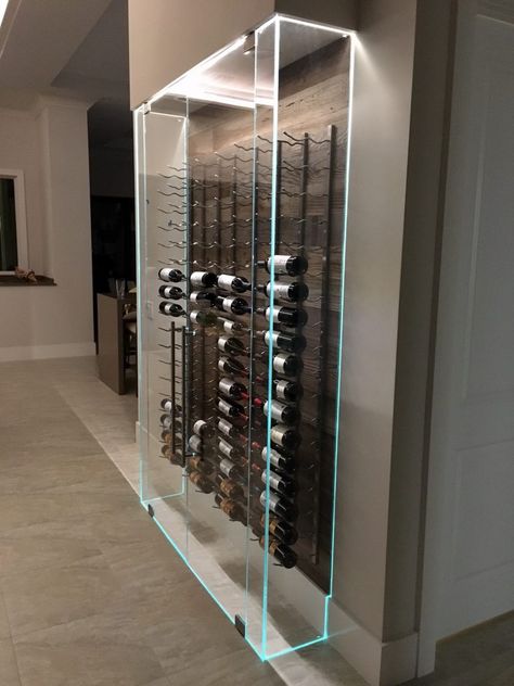 under stairs frameless glass win e enclosure vintage view racking Cave A Vin Design, Wine Cellar Wall, Wine Storage Wall, Wine Cellar Basement, Glass Wine Cellar, Wine Cellar Door, Vintage View, Wine Closet, Home Wine Cellars