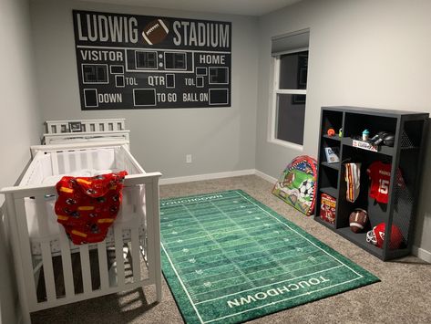 Football nursery, football scoreboard, football locker and bookcase, boys room, kansas city chiefs Sports Theme Nursery Ideas, Nursery Ideas Football, Locker Room Nursery, Baby Boy Sports Nursery Room Ideas, Sporty Nursery Ideas, Nursery Football Theme, Modern Sports Nursery, Toddler Football Room, Sport Nursery Ideas Boy