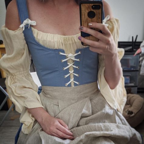 Happy clients =happy us! Jordan is wearing our Ren Faire bodice in Dresden Blue, a custom color choice selected by her to match the rest of her costume. What’s your color going to be? #periodcorsetscustoms #periodcorsetsfestivalwear #renfairecostume #renfairecorset #renaissancefestival #renaissancefaire #halloweencorset #bluecorset Ren Faire Outfits, Color Mask, Ren Faire Costume, Fair Outfits, Mask Style, Blue Corset, Cottagecore Fashion, Medieval Costume, Corset Bodice