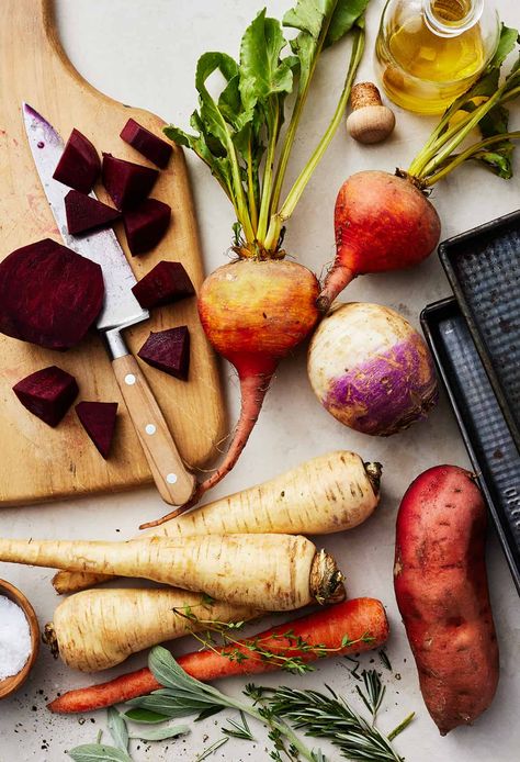 These oven roasted root vegetables are an easy, delicious side dish for Thanksgiving, Christmas, or any fall or winter meal. Tossed with fragrant fresh herbs, they're tender, caramelized, and full of rich, earthy flavor. Thanksgiving Root Vegetables, Fall Harvest Roasted Vegetables, Best Roasted Root Vegetables, Chili Vegetables, Side Dish Carrots, Crockpot Vegetables, Roasted Fall Veggies Root Vegetables, Oven Roasted Root Vegetables, Sheet Pan Roasted Root Vegetables