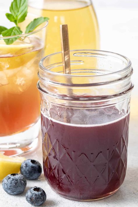 This Blueberry Simple Syrup recipe is made with blueberries, lemon juice, honey and water. Simple blueberry syrup is a great way to add flavor and sweetness to iced tea, lemonade, sparkling water and more. Honey Simple Syrup Recipe, Quinoa Salad Dressing, Blueberry Honey, Blueberry Simple Syrup, Simple Syrup Recipe, Honey Simple Syrup, Canned Blueberries, Iced Tea Lemonade, Mint Simple Syrup