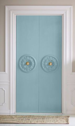 Bring some Parisian charm to closet doors with inexpensive ceiling medallions. Just nail them on and paint. Painted Folding Closet Doors, Decorating Interior Doors, Victorian Closet Doors, Painted Closets Inside, Decorated Closet Doors, Decorative Closet Doors, Blue Closet Doors, Wallpaper On Door, Painted Closet Doors Art