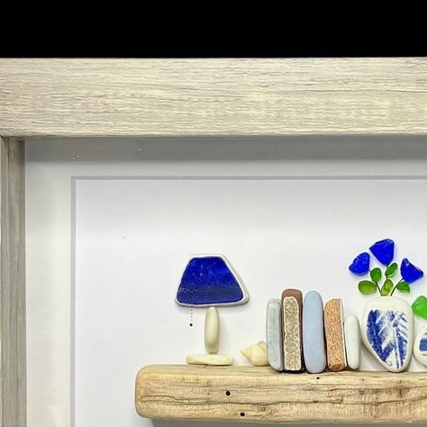 Sea Glass Art by Cristina Lugo on Instagram: "SOLD. Are they broken tiles, plates, glass? Or are they a lamp, books, planters, plants? That what my brain does when I pick up stuff during my beach combing trips. This latest bookshelf is the result! It is framed inside a 5x7 shadow box and, it’s available. If you want to know more about it, just send me a message privately #trashorart #fromtrashtoart #repurposing #reusingcreatively #debasuraaarte #reusocreativo #cristinasseaglass #seapottery #beachfinds #bookshelf #artimitateslife #bookworms #booksandplants #seaglass #beachcomber #madeinpuertorico #hechoenpuertorico #librosyplantas" Sea Pottery, Sea Glass Crafts, Beach Combing, Sea Glass Art, Beach Glass, Glass Crafts, Sea Glass, Shadow Box, Bookshelves