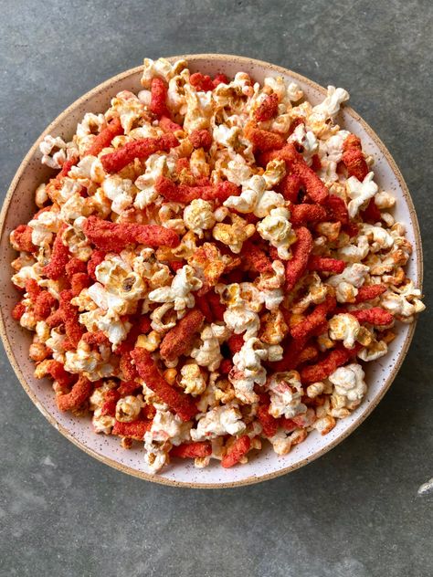 Flamin' Hot Cheetos Popcorn Copycat Recipe  | Kitchn Essen, Spicy Cheetos Recipe, Cheeto Popcorn, Homemade Cheetos, Cheetos Popcorn, Crunchy Cheetos, Cheetos Flamin Hot, Cheetos Recipe, Cinnamon Sugar Popcorn