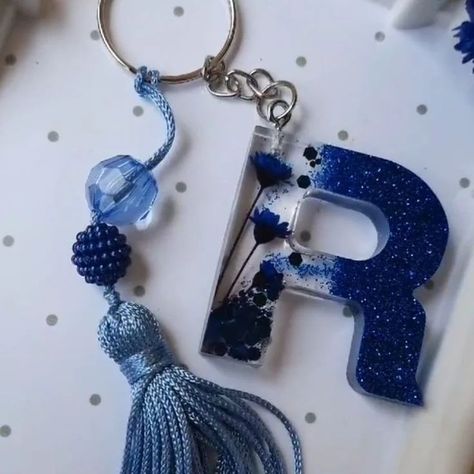 Beautiful 😍 resin keyring only for ₹100🤩 (Minimum order quantity- 4).......... ☆FREE SHIPPING☆ For single keyring you have to pay shipping Resin Keychain Ideas Alphabet, Resin Alphabet Keychain, Diy Resin Keychain, Hand Jewelry Rings, Resin Crafts Tutorial, Alphabet Wallpaper, Diy Resin Projects, Resin Jewelry Diy, Resin Keychain