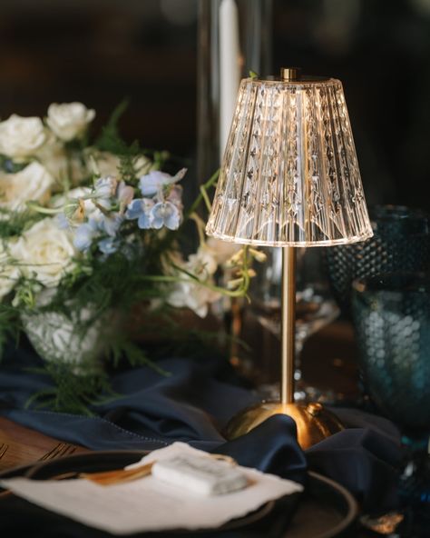 Published on @confettiwedmag: whimsy and elegance in the mountains, a styled shoot featuring our new rechargeable crystal shade touch lamps ✨ These lamps brought ambiance & warmth to the cool-toned colour palette, and added some visual height to the tablescape, layered with blue goblets & taper candles. …Are you as obsessed with these lamps as we are? 🥰 Creative Team Credits — Photographer: @fontaine_photo_film Workshop: @theothersideworkshop Planning/Design: @primroseyeg Venues: @fore... Table Lamps Wedding, Table Lamps Wedding Decor, Cordless Lamp Wedding, Table Lamp Wedding, Wedding Lamps, Table Lamp Wedding Centerpiece, Wedding Reception Table Lamps, Wedding Table With Brass Candlesticks, Wedding Table Lighting