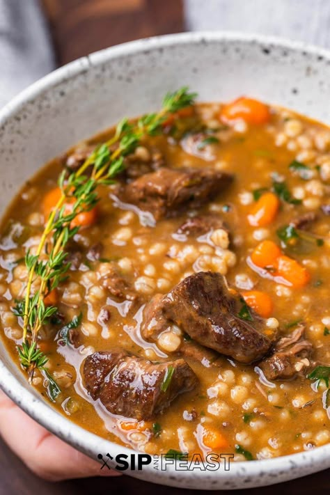 Beef barley soup with chuck roast, carrots, celery, onion, pearl barley, and fresh thyme is incredibly satisfying and nourishing. Serve with crusty bread and a green salad for a complete meal. #beefbarleysoup #beefsouprecipes #soup Beef Barley Lentil Soup, Recipes With Beef Soup Bones, Beef Barley Soup In Crockpot, Beef Soup Bone Recipes, Beef Barley Mushroom Soup, Sip And Feast Recipes, Beef And Barley Stew, Ideas For Supper, Beef And Barley Soup