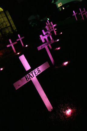 Our DIY spooky, lit graveyard crosses! Diy Halloween Decorations Outdoor Tombstones, Thriller Halloween Decorations, Demonic Halloween Decorations, Homemade Halloween Graveyard, Graveyard Office Decorations, Halloween Party Graveyard Theme, Diy Haunted House Ideas Outdoor, Diy Halloween Cemetary, Graveyard Decorations Halloween