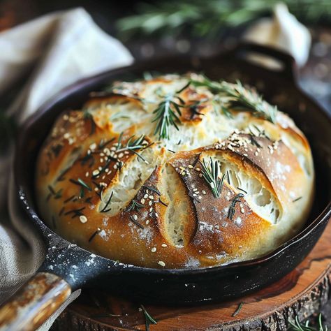 Discover the deliciously simple recipe for Rustic No Knead Rosemary Garlic Bread! This fragrant bread is a must-try for bread… Rustic Christmas Food, Rustic Garlic Bread, Rustic Loaf Bread Recipe, Rosemary French Bread, Rustic Bread Recipe Dutch Ovens, Rosemary Bread Recipe Easy, Rustic No Knead Rosemary Garlic Bread, How To Score Bread, Cinnamon Raisin Bread Recipe Easy