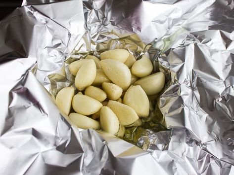 How to Roast Peeled Garlic Cloves in the Oven - Instructions and Directions Garlic In The Oven, Roasted Garlic Recipe, Garlic Roaster, Roasting Garlic In Oven, Roast Garlic, Roasted Garlic Cloves, How To Roast, Allergy Free Recipes, Garlic Recipes